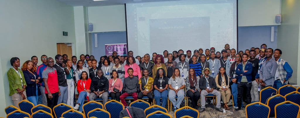 The whole room gathered for a group photograph at the close of the summit